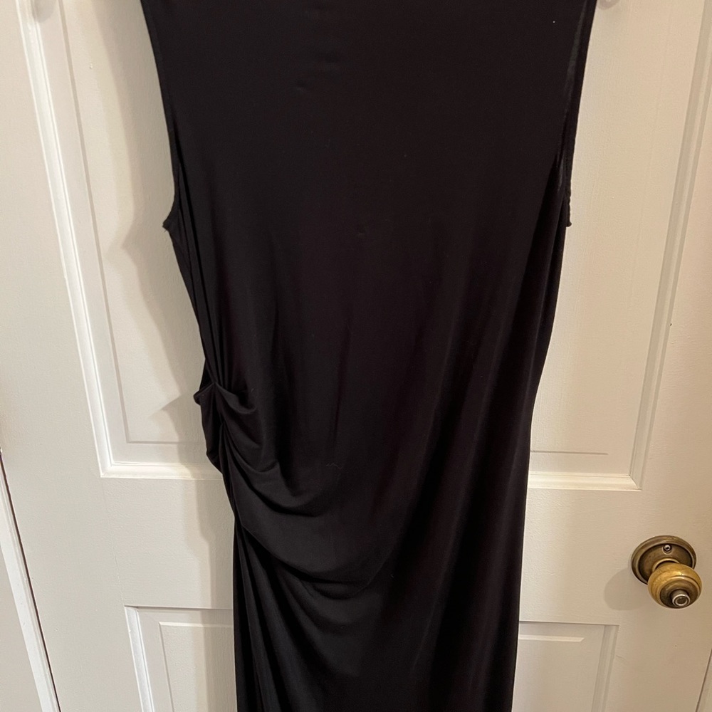 Calvin Klein black size small, ruched on left side.